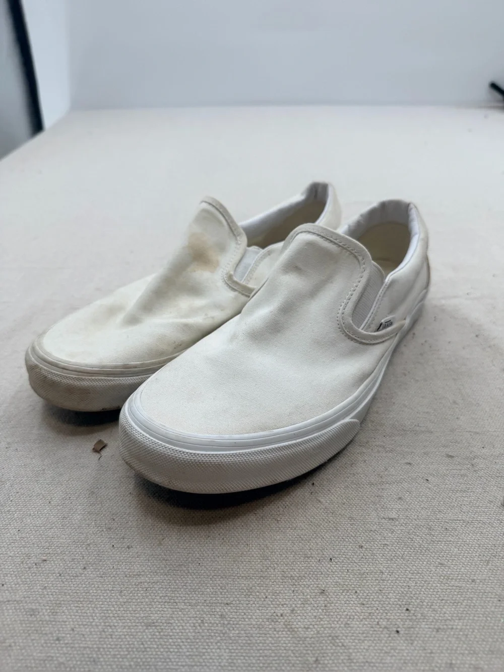 Vans  White Slip-On Sneakers